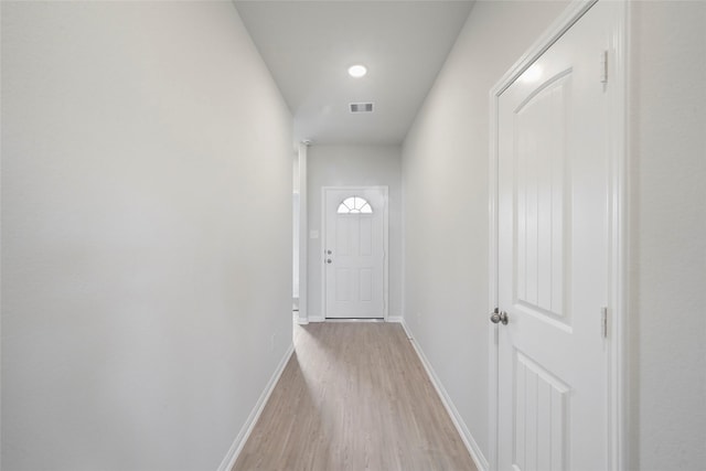 805 Clear Valley Ln, Dayton, TX 77535 - entryway featuring light wood finished floors and baseboards