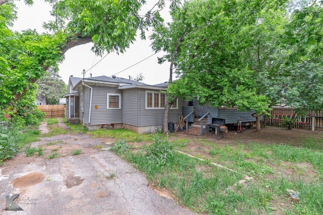 1166 Ross Ave, Abilene, TX 79605 - rear view of property featuring entry steps