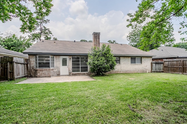 5606 Cypressgate Dr, Spring, TX 77373 - rear view of property featuring a patio area, a chimney, and brick siding