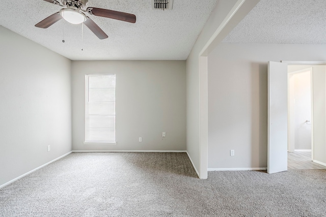 5606 Cypressgate Dr, Spring, TX 77373 - carpeted empty room featuring a textured ceiling, ceiling fan, and baseboards