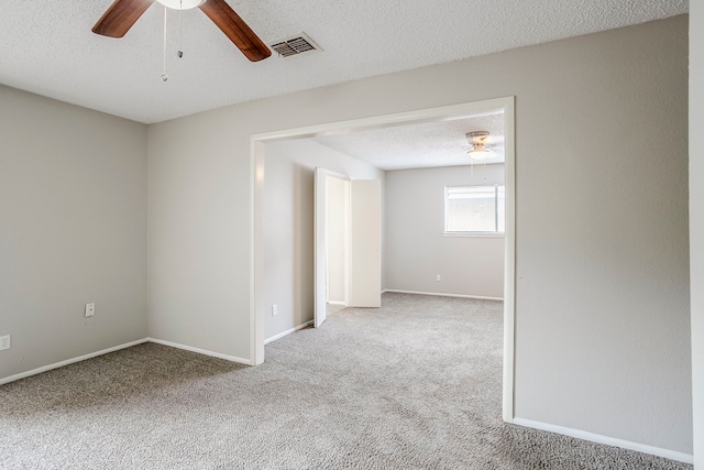 5606 Cypressgate Dr, Spring, TX 77373 - unfurnished room featuring a ceiling fan, carpet, a textured ceiling, and baseboards