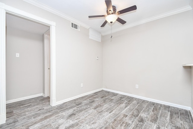 2350 Bering Dr Unit 105, Houston, TX 77057 - empty room featuring a ceiling fan, wood finished floors, crown molding, and baseboards