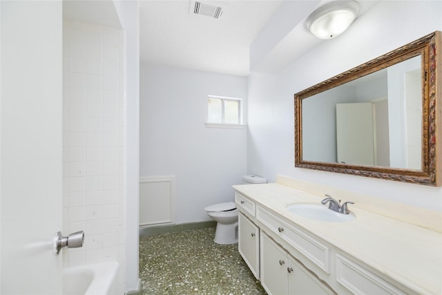 1003 Romaine Ln, Houston, TX 77090 - bathroom featuring vanity, toilet, baseboards, and bathing tub / shower combination