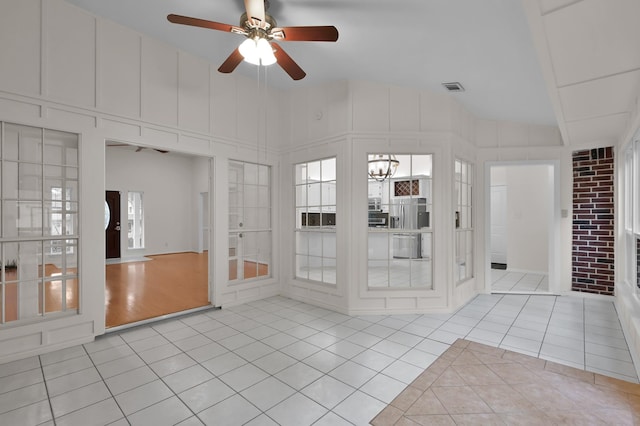 2457 Pebblebrook Cir, Conroe, TX 77384 - unfurnished sunroom with vaulted ceiling and a chandelier