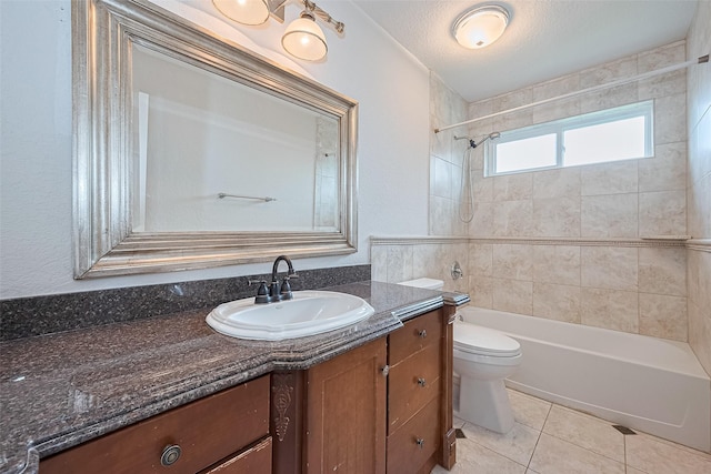 14202 Valley Bend Ct, Sugar Land, TX 77498 - bathroom featuring vanity, shower / washtub combination, toilet, tile patterned floors, and a textured ceiling
