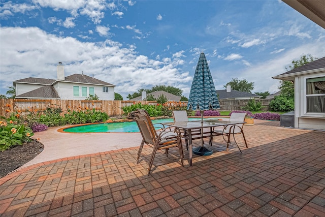 14202 Valley Bend Ct, Sugar Land, TX 77498 - fenced backyard with a patio and outdoor dining area