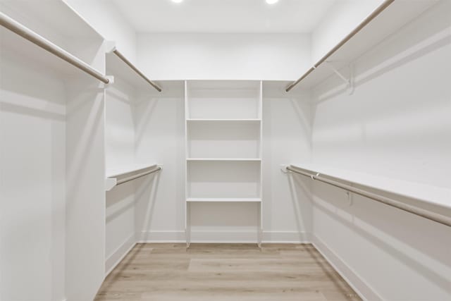 5013 Hardway St, Houston, TX 77092 - spacious closet featuring light wood-style flooring