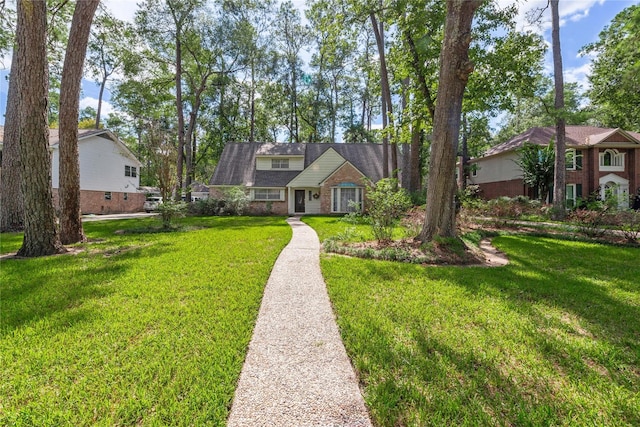 6211 Darby Way, Spring, TX 77389 - view of front of home with a front yard and brick siding