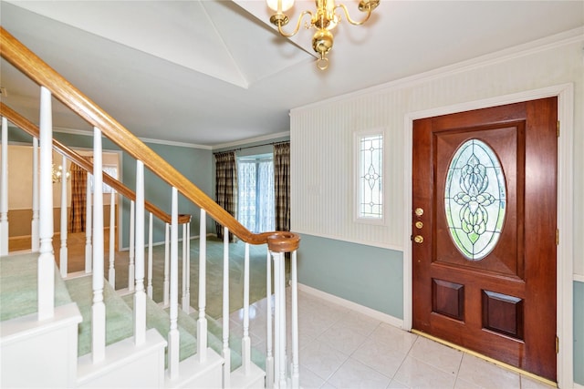 6211 Darby Way, Spring, TX 77389 - tiled entryway featuring baseboards, ornamental molding, stairs, and a chandelier