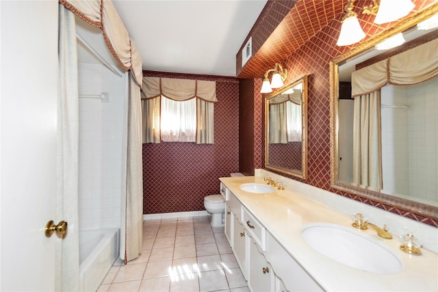 6211 Darby Way, Spring, TX 77389 - full bathroom with tile patterned floors, double vanity, toilet, and shower / bath combo