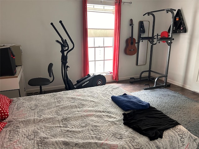 3400 Timmons Ln Unit 30, Houston, TX 77027 - bedroom with baseboards and wood finished floors