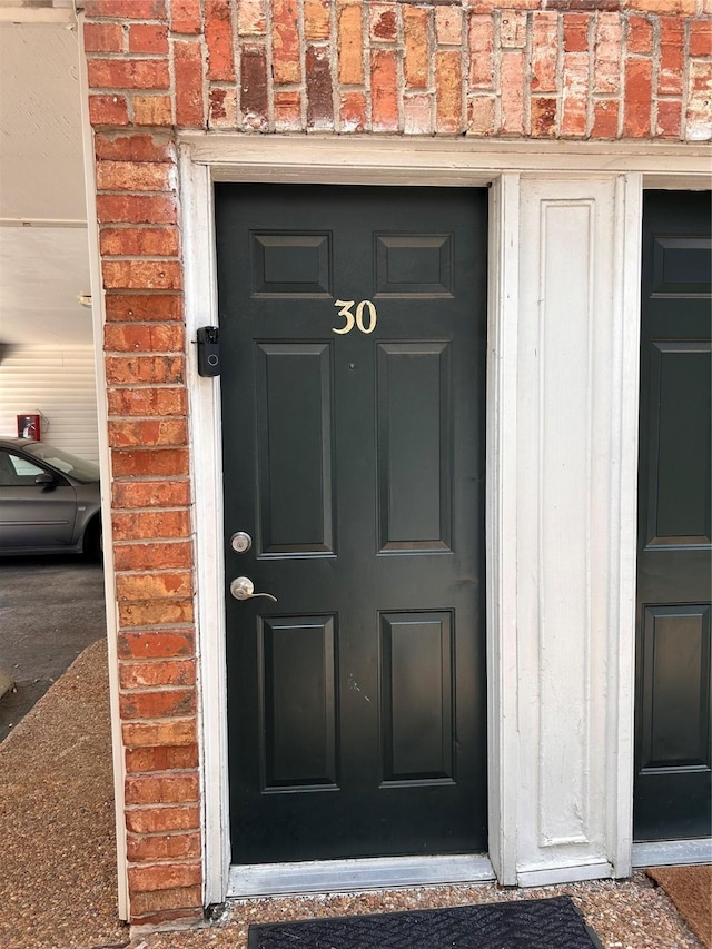 3400 Timmons Ln Unit 30, Houston, TX 77027 - property entrance featuring brick siding