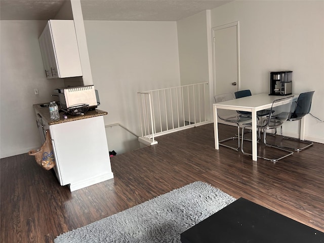 3400 Timmons Ln Unit 30, Houston, TX 77027 - office area featuring wood finished floors and baseboards