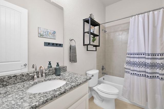 9103 Lacombe Ln, Tomball, TX 77375 - bathroom featuring vanity, toilet, shower / bath combo with shower curtain, and tile patterned floors