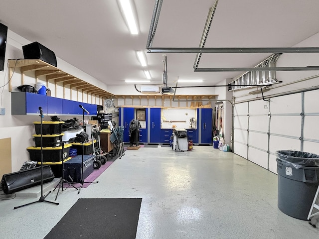 9103 Lacombe Ln, Tomball, TX 77375 - garage featuring a garage door opener