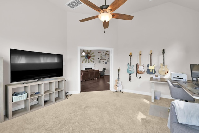 9103 Lacombe Ln, Tomball, TX 77375 - home office featuring ceiling fan, carpet, high vaulted ceiling, and baseboards