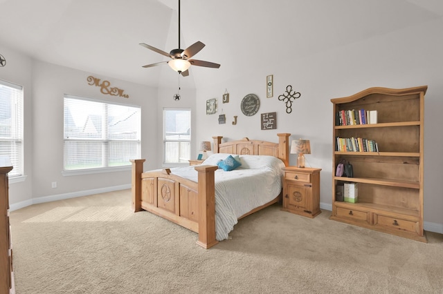 9103 Lacombe Ln, Tomball, TX 77375 - bedroom with light colored carpet, baseboards, vaulted ceiling, and ceiling fan