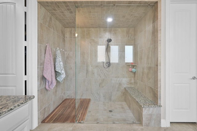 9103 Lacombe Ln, Tomball, TX 77375 - bathroom with a walk in shower and vanity