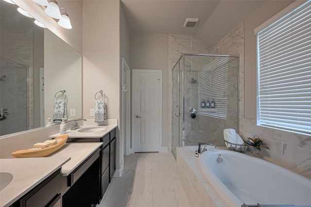 10147 Deerpark Dr, Missouri City, TX 77459 - full bath with marble finish floors, a shower stall, a garden tub, and double vanity