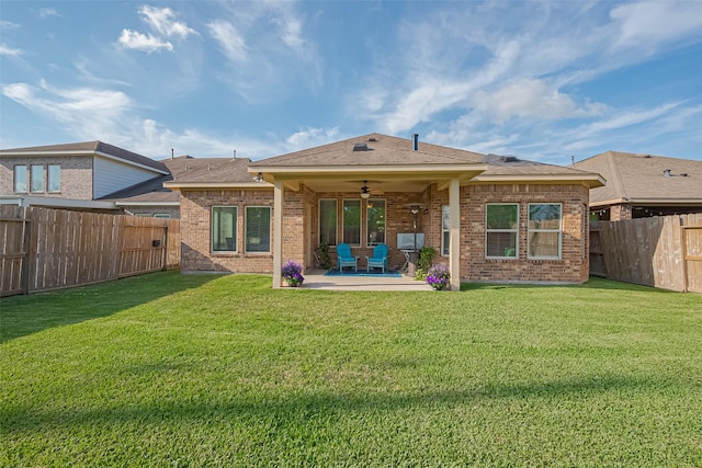 10147 Deerpark Dr, Missouri City, TX 77459 - rear view of property featuring brick siding, a ceiling fan, a patio area, and roof with shingles