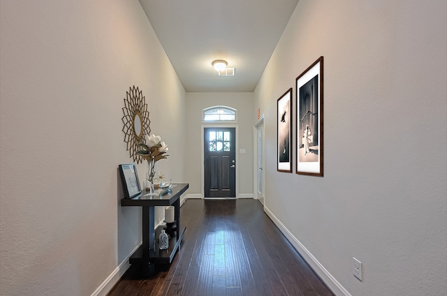 10147 Deerpark Dr, Missouri City, TX 77459 - entryway featuring dark wood-type flooring and baseboards