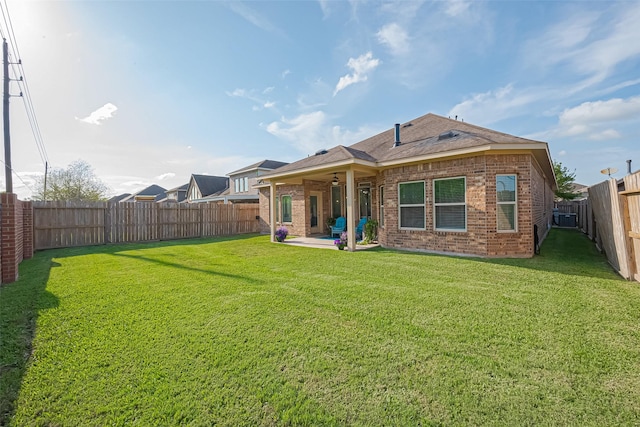 10147 Deerpark Dr, Missouri City, TX 77459 - rear view of property with brick siding, a patio area, ceiling fan, central AC unit, and a shingled roof