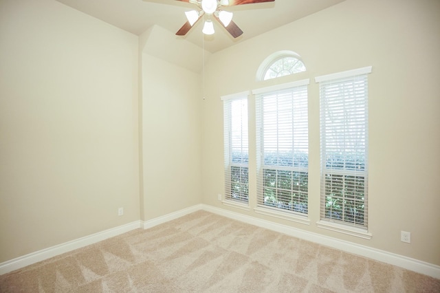14110 Green Thicket Dr, Pearland, TX 77584 - carpeted empty room featuring ceiling fan, baseboards, and vaulted ceiling