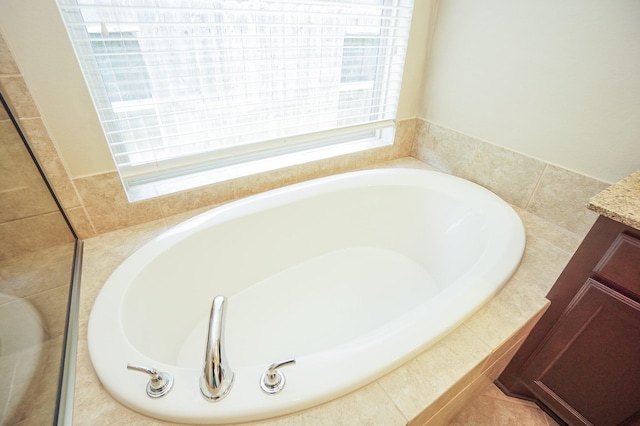 14110 Green Thicket Dr, Pearland, TX 77584 - full bath featuring a garden tub and vanity