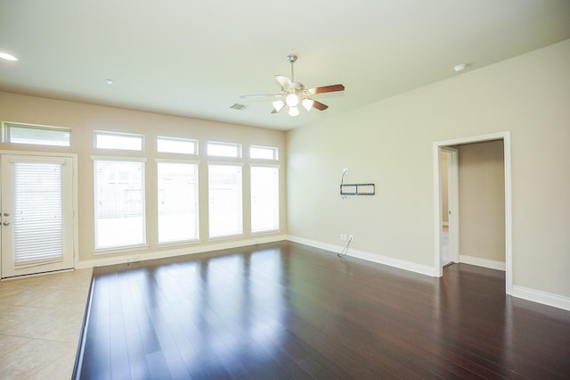 14110 Green Thicket Dr, Pearland, TX 77584 - unfurnished room with baseboards, ceiling fan, wood finished floors, and a smoke detector