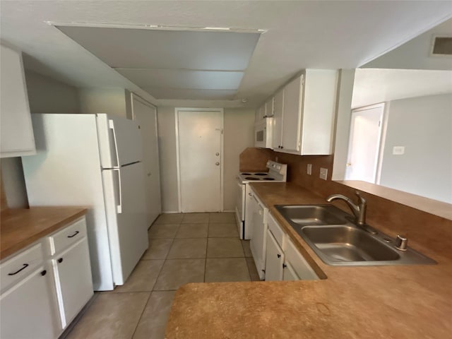 4111 Fitzwater Dr, Spring, TX 77373 - kitchen featuring a sink, white appliances, and white cabinets