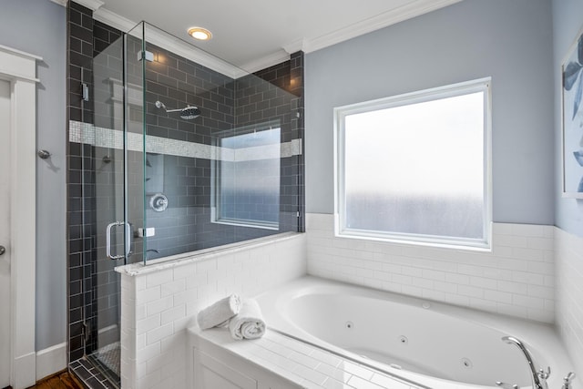 823 E 27th St, Houston, TX 77009 - full bathroom with a stall shower, a jetted tub, and ornamental molding