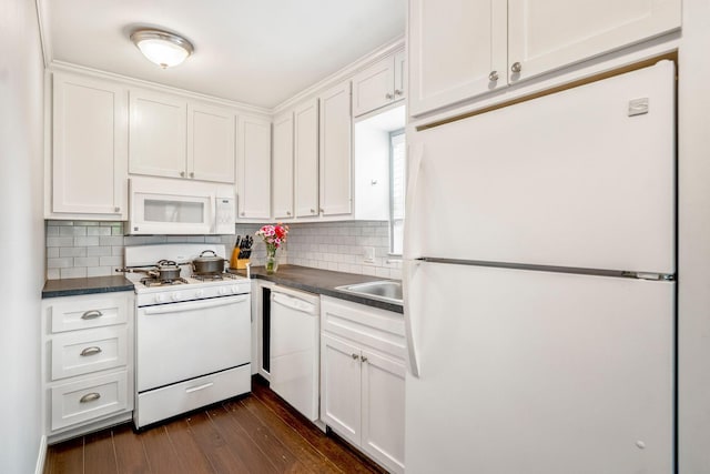 823 E 27th St, Houston, TX 77009 - kitchen with white appliances, dark countertops, and white cabinets