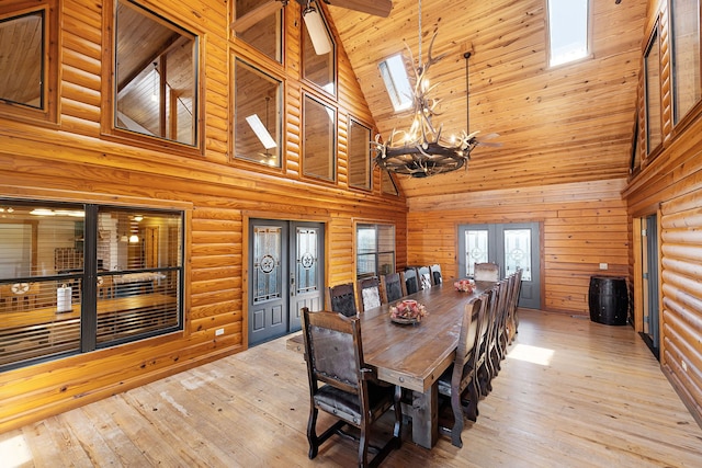 1012 Mourning Dove, Canyon Lake, TX 78133 - dining area with high vaulted ceiling, french doors, a chandelier, hardwood / wood-style flooring, and wood ceiling