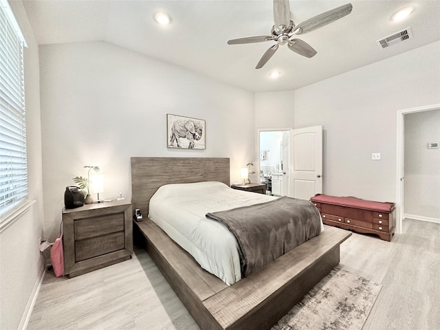 1410 Alice, Beaumont, TX 77705 - bedroom with light wood finished floors, baseboards, multiple windows, recessed lighting, and vaulted ceiling