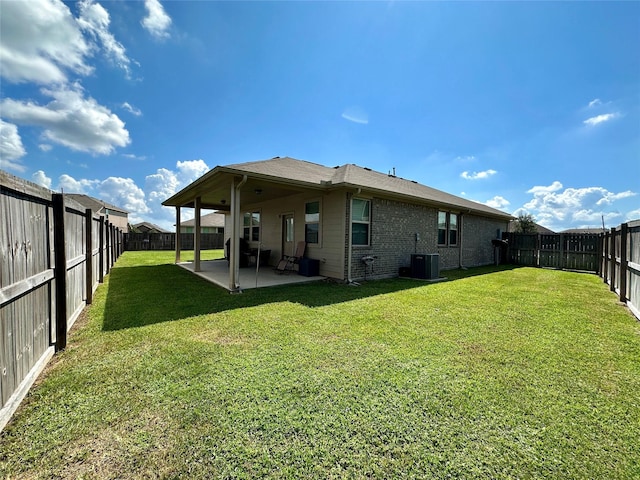 1410 Alice, Beaumont, TX 77705 - back of property with a patio and central AC