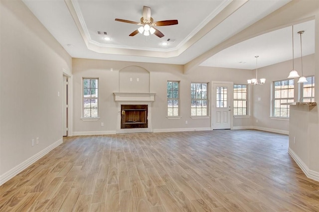 1805 Rollingwood Dr, Huntsville, TX 77340 - unfurnished living room with a ceiling fan, light wood-type flooring, healthy amount of natural light, and ornamental molding