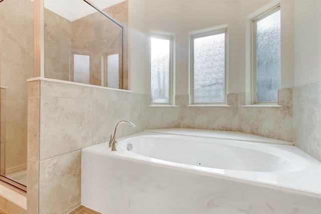1805 Rollingwood Dr, Huntsville, TX 77340 - full bath featuring a bath and tiled shower