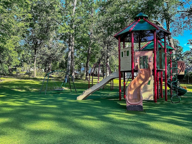1805 Rollingwood Dr, Huntsville, TX 77340 - community play area featuring a lawn and view of scattered trees