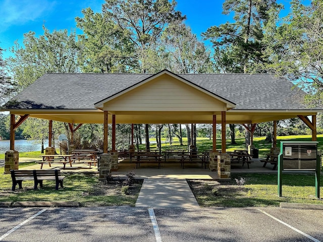 1805 Rollingwood Dr, Huntsville, TX 77340 - surrounding community featuring a gazebo, a water view, a lawn, and uncovered parking