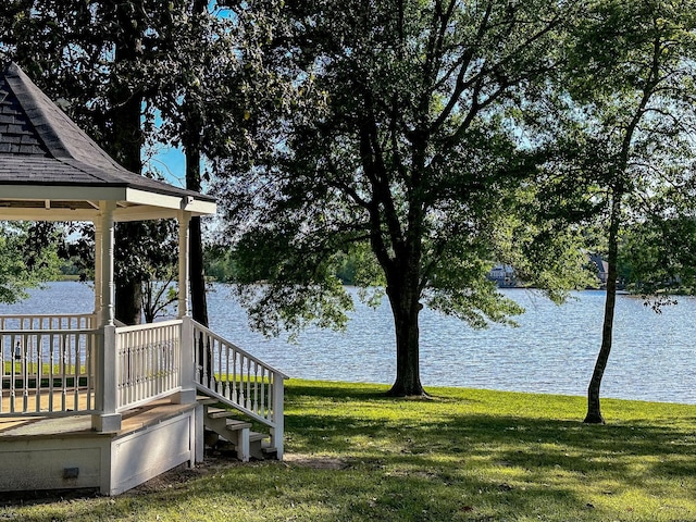 1805 Rollingwood Dr, Huntsville, TX 77340 - view of grassy yard with a water view and a gazebo