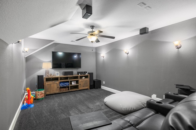 29122 Champions Dr, Magnolia, TX 77355 - cinema room with carpet, baseboards, a ceiling fan, and a textured ceiling