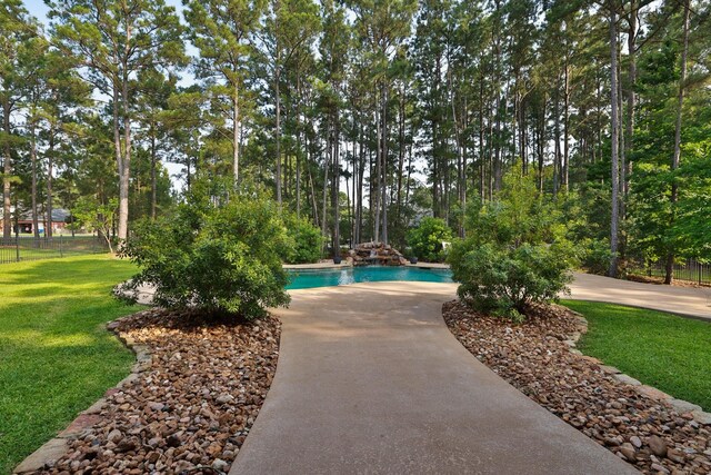 29122 Champions Dr, Magnolia, TX 77355 - view of property's community with a swimming pool