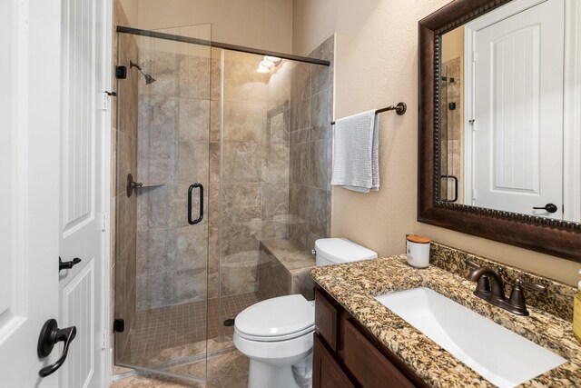 29122 Champions Dr, Magnolia, TX 77355 - full bath featuring vanity, toilet, and a shower stall