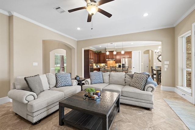 29122 Champions Dr, Magnolia, TX 77355 - living area with arched walkways, crown molding, a ceiling fan, recessed lighting, and baseboards
