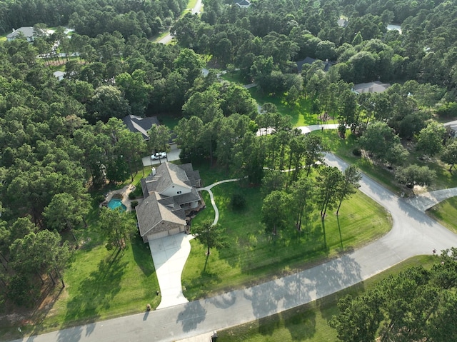 29122 Champions Dr, Magnolia, TX 77355 - aerial view of property and surrounding area with a heavily wooded area