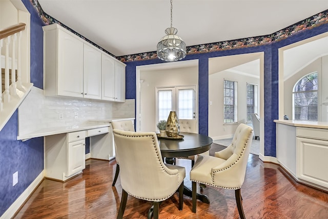 1217 Red Wing Dr, Friendswood, TX 77546 - dining room featuring healthy amount of natural light, dark wood-style flooring, and baseboards