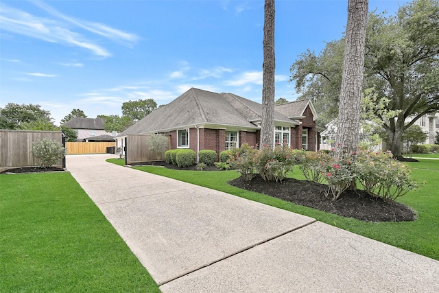 1405 Blueberry Ln, Friendswood, TX 77546 - ranch-style home featuring concrete driveway and brick siding