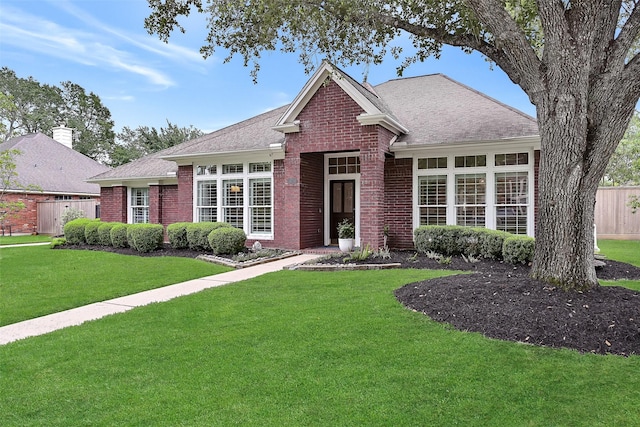 1405 Blueberry Ln, Friendswood, TX 77546 - view of front of home with brick siding and roof with shingles