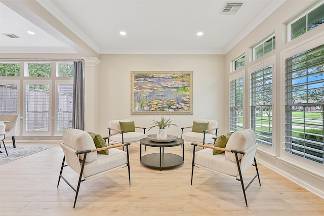 1405 Blueberry Ln, Friendswood, TX 77546 - living area featuring ornamental molding, light wood-style floors, recessed lighting, and baseboards