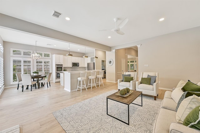 1405 Blueberry Ln, Friendswood, TX 77546 - living room with a ceiling fan, light wood-type flooring, recessed lighting, and baseboards